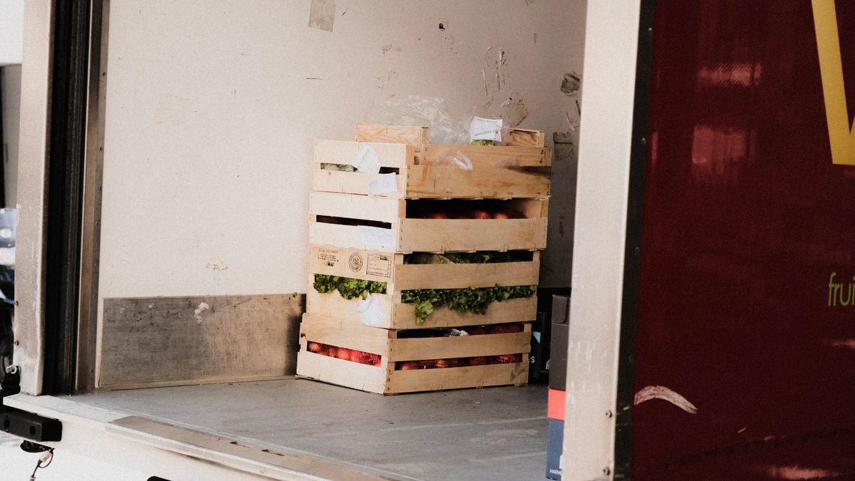 Wooden crates of vegetables, ready for delivery